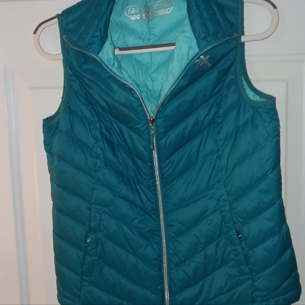 Zeroxposur Teal Vest Size M Good condition.